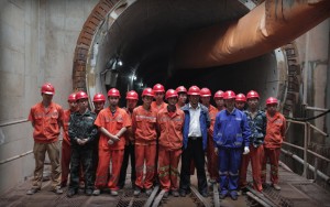 CRCC crew stand proudly in front of the tunnel entrance