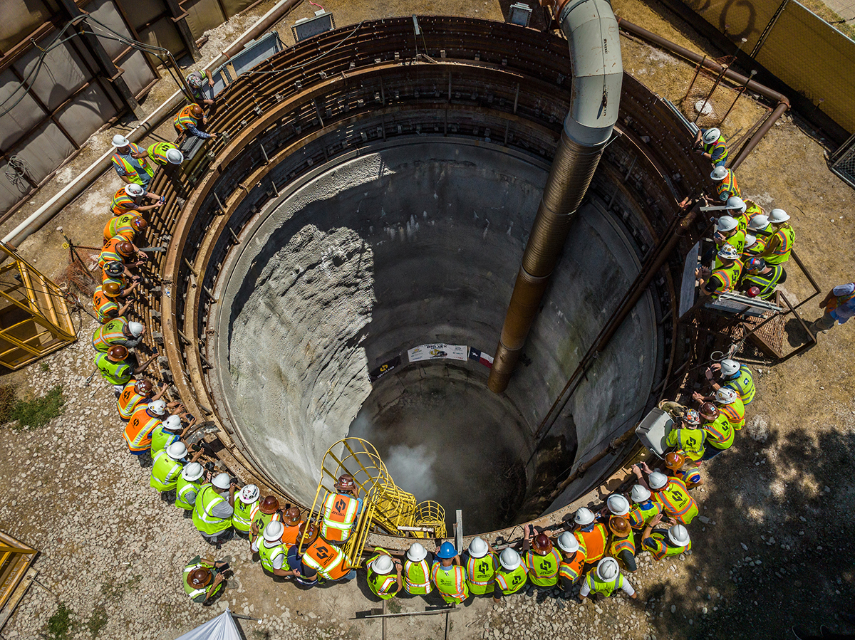 Personnel gather at the breakthrough shaft for Mill Creek.